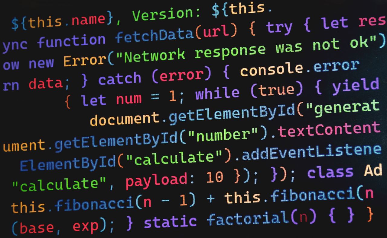 Vibrant JavaScript code displayed on a screen, highlighting programming concepts and software development.